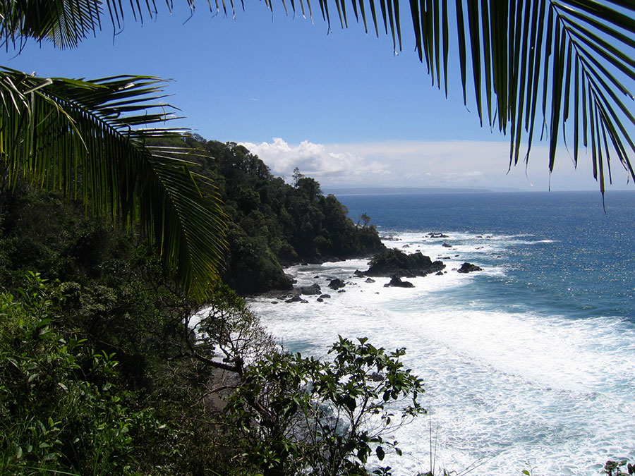 Cliffs and sea foam on Caño Island